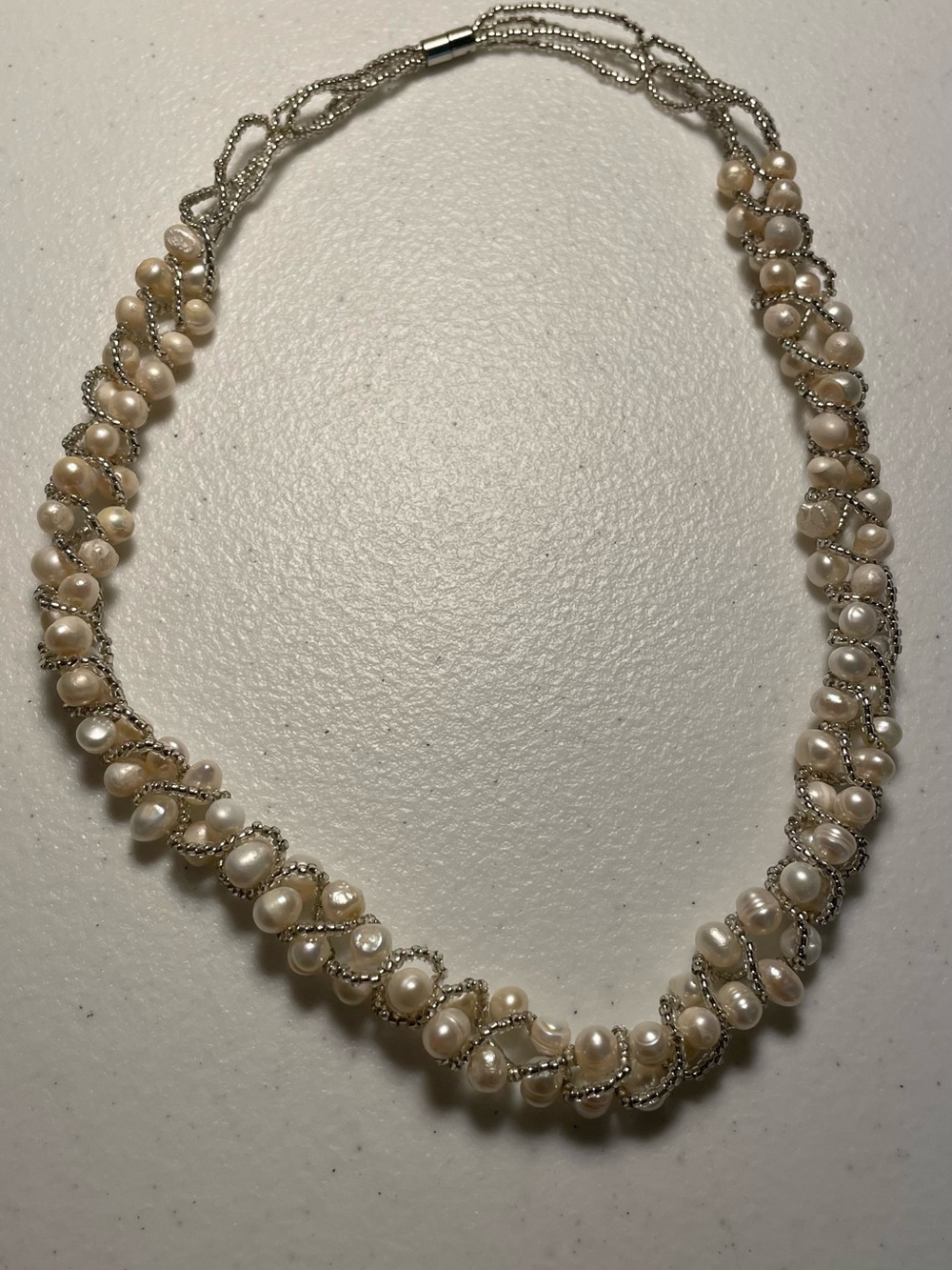 Faux Pearls Twist Necklace in Cream and Silver - Brand Unspecified